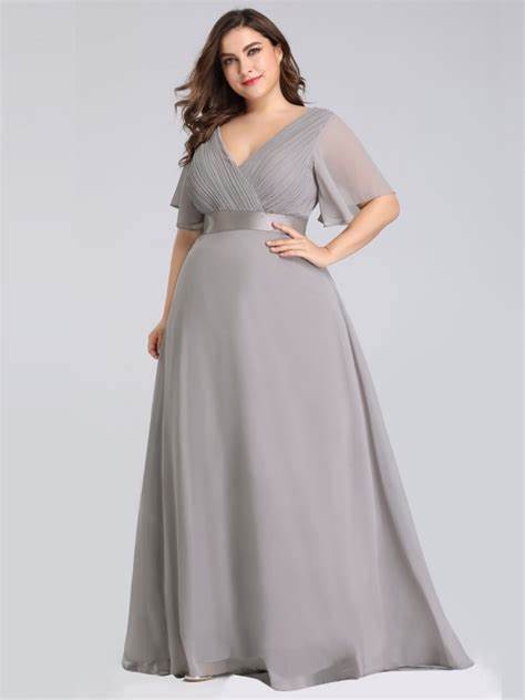 0526 SIZE:16 EVER PRETTY GRAY FLUTTER SLV EVENING GOWN W/RUCHING AT BODICE, V-NECK, V-BACK, CONCEALED BACK ZIPPER, SATIN EMPIRE WAIST AND SWING SKIRT RTL:$66.99